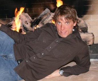 sexy-guy-in-front-of-fireplace